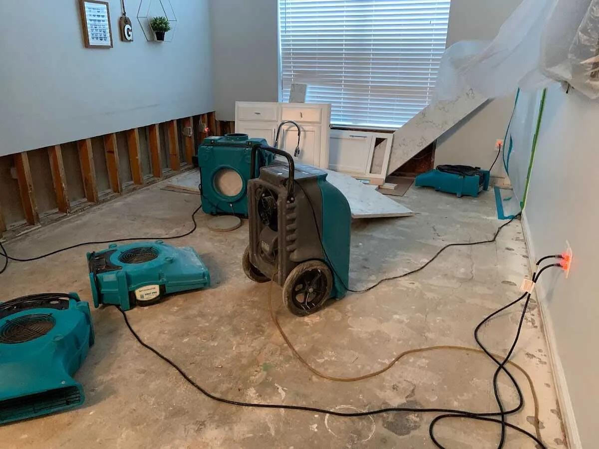 Dehumidifier in flood-cut room for Water Damage Restoration in Fostoria